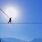 Tightrope Walker Balancing on the Rope